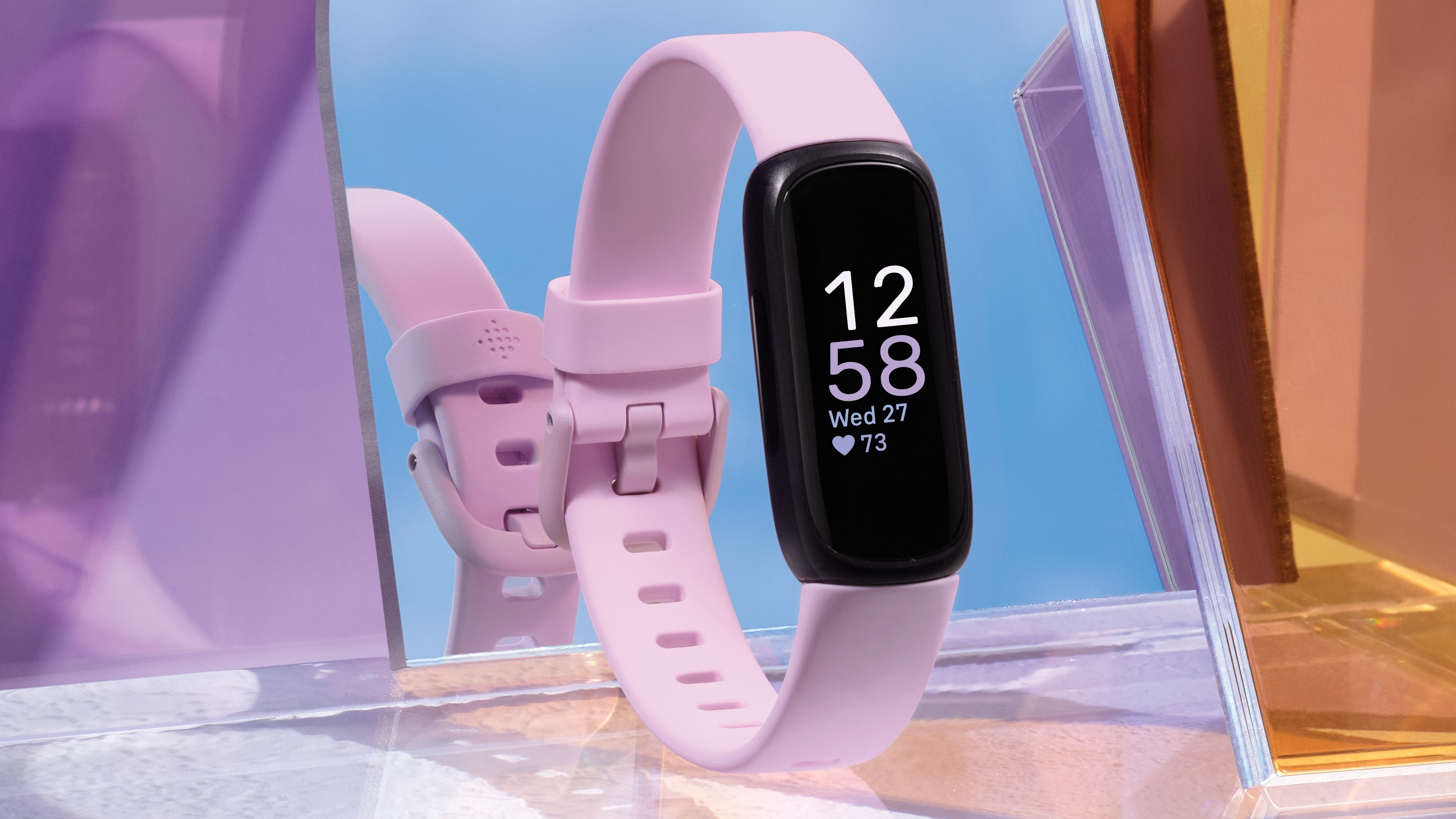 Fitbit Inspire 3 fitness tracker showing sleep score and activity rings